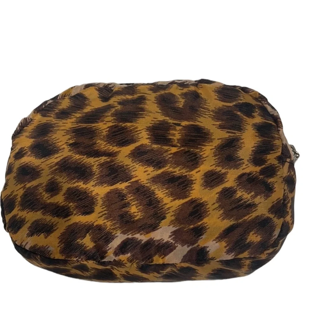 Nylon zipper tote with exterior zipper pocket. In Leopard. NWOT